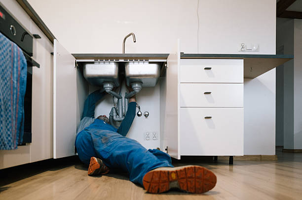 Professional Drain Cleaning technician working in Newfields, NH
